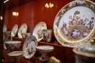 A close-up of specimens of antique porcelain presented in the gallery