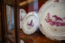 Close-ups of fantastic animal motifs on examples of Meissen porcelain